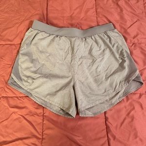 Under Armour running shorts. Size small. New without tags, never worn.